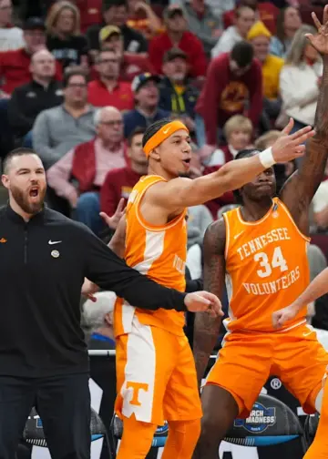 Michigan Wolverines and Tennessee Volunteers play in Elite 8